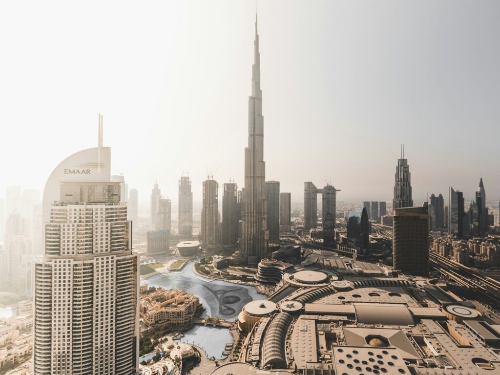 high rise buildings near body of water during daytime